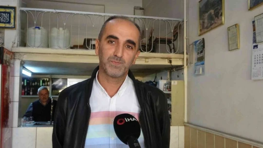 Down sendromlu çaycı, esnafın neşe kaynağı