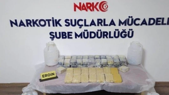Eroini peynir bidonları içine saklamışlar