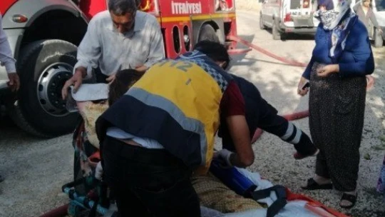 ikamette çıkan yangında bir kadın dumandan zehirlendi