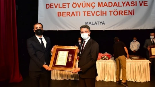 Şehit yakınları ve gazilere gurur madalyası