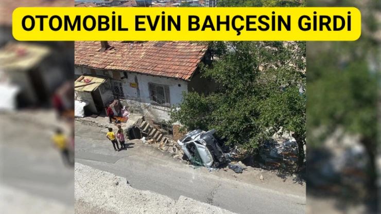 Otomobil evin bahçesine girdi