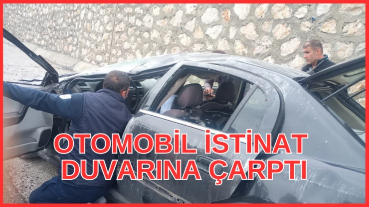 Otomobil istinat duvarına çarptı